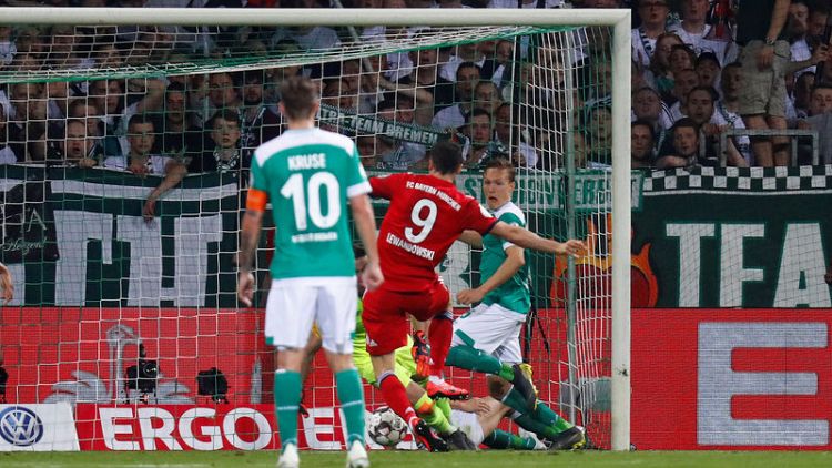 Bayern reach German Cup final to keep double in sight
