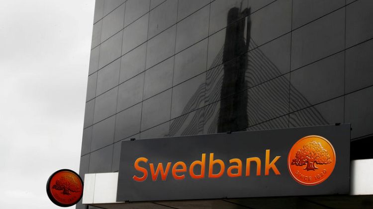 Swedbank first-quarter profit above forecast, says cooperating with U.S. authorities