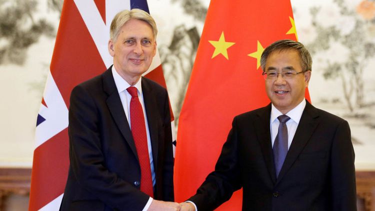 الصين تعبر عن أسفها لأن قضية بحر الصين الجنوبي أضرت بالعلاقات مع بريطانيا