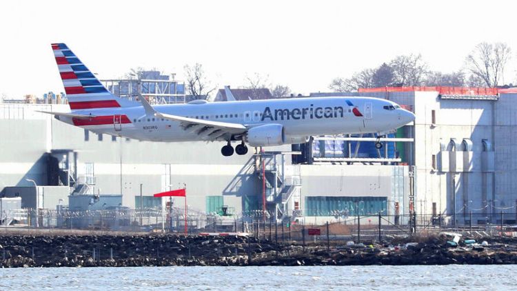 American Airlines cuts outlook on 737 MAX, sees jets flying again by mid-August