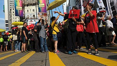Thousands take to Hong Kong streets to protest new extradition laws
