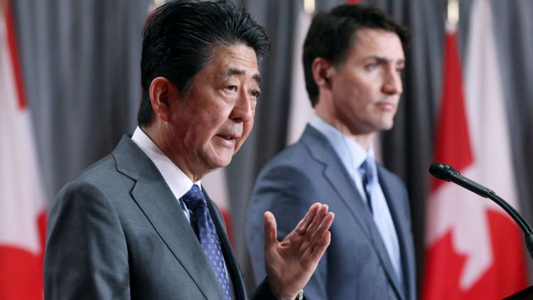 Canadian and Japanese leaders tout benefits of Pacific trade deal that Trump abandoned