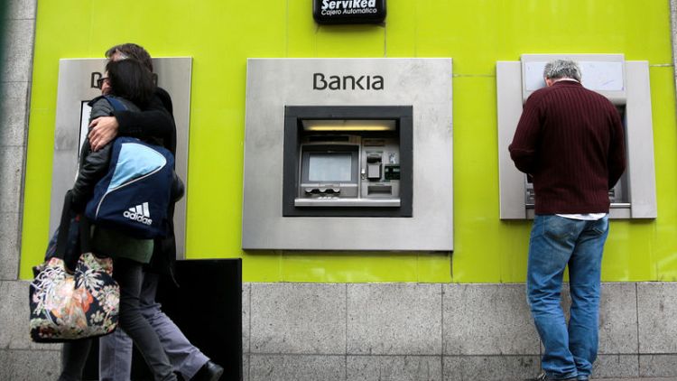 Spain's Bankia first-quarter net profit drops on lower trading income