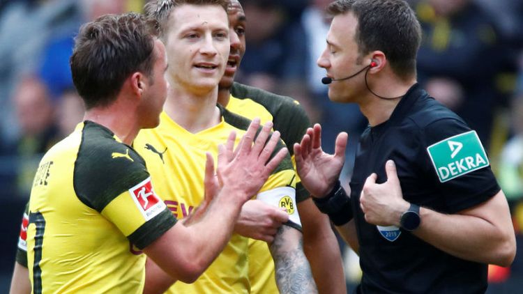 Dortmund's Reus banned for two matches, Wolf for three