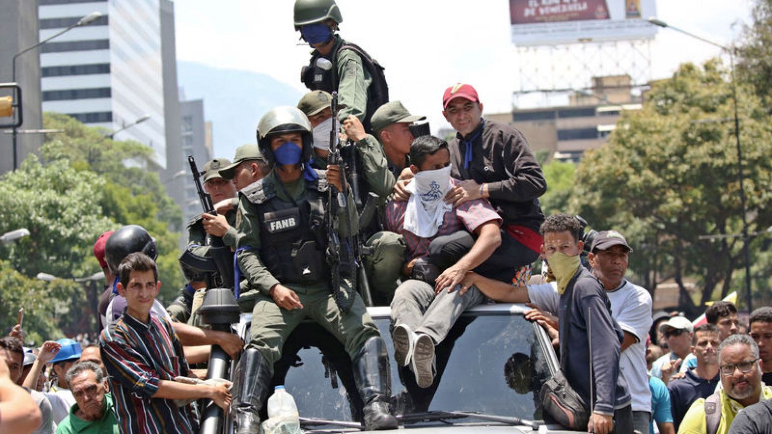 Venezuela's Guaido calls for uprising but military loyal to Maduro for now