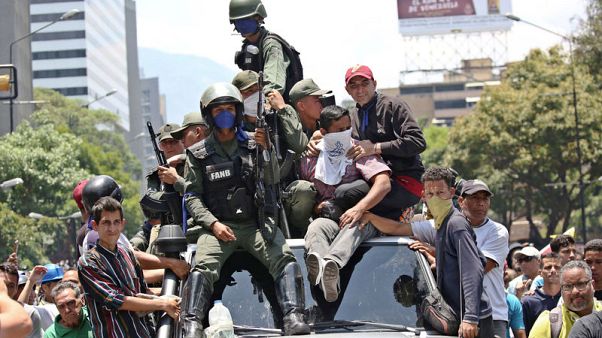 Venezuela's Guaido calls for uprising but military loyal to Maduro for now Venezuela's Guaido calls for uprising but military loyal to Maduro for now