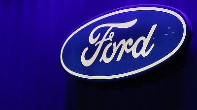 Ford partners with Amazon to allow package deliveries to owners' cars Ford partners with Amazon to allow package deliveries to owners' cars