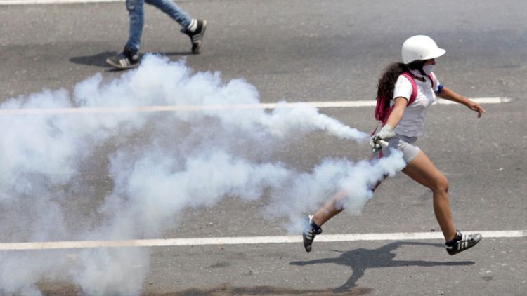 Thousands begin protest against Venezuela's Maduro, U.S. and Russia at odds