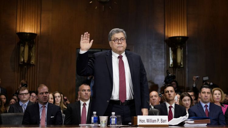 In tense hearing, Barr defends clearing Trump on obstruction of justice