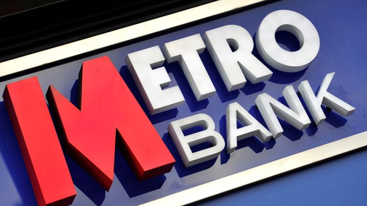 Britain's Metro Bank first quarter profit halves
