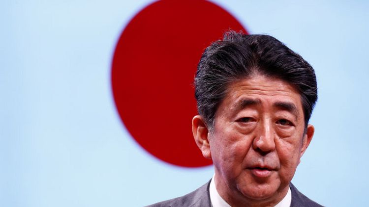 Japan's Abe signals shift on North Korea, says will meet Kim without conditions - media