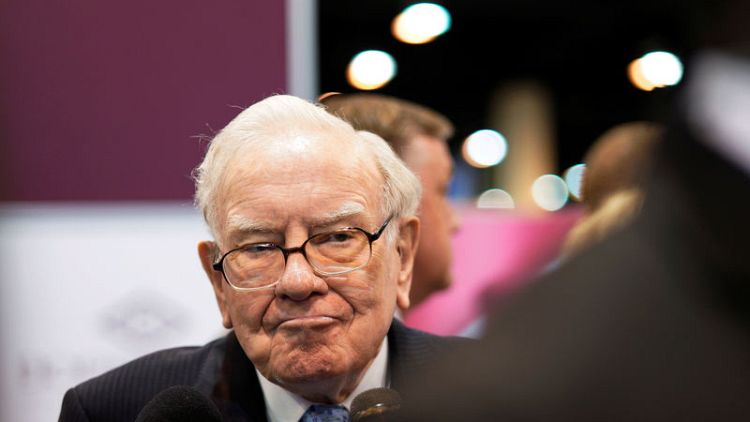 Buffett - low inflation at odds with current fiscal, monetary policy