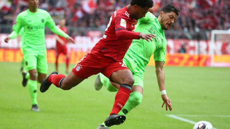 Bayern make hard work of table-propping 10-man Hanover 96