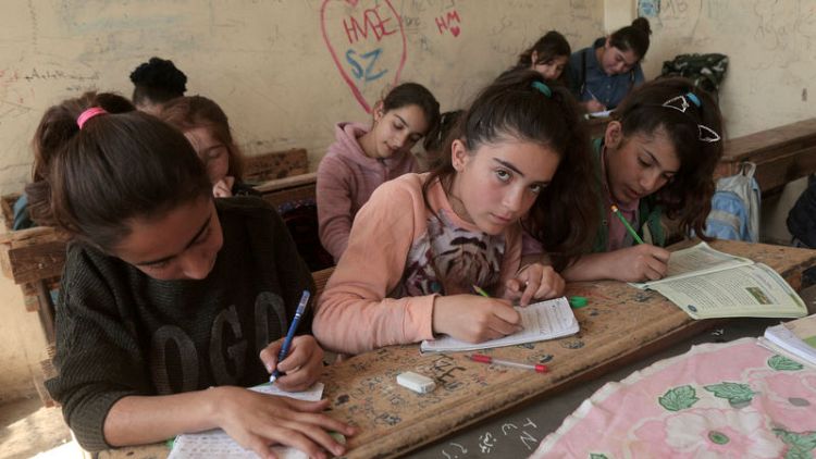 No turning back - Syrian Kurds reshape region with books and schools