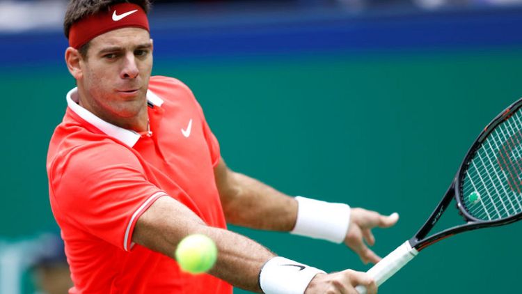 Del Potro says to play singles at Madrid Open