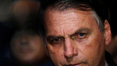 Brazil's Bolsonaro signs decree easing gun import, ammo limits Brazil's Bolsonaro signs decree easing gun import, ammo limits