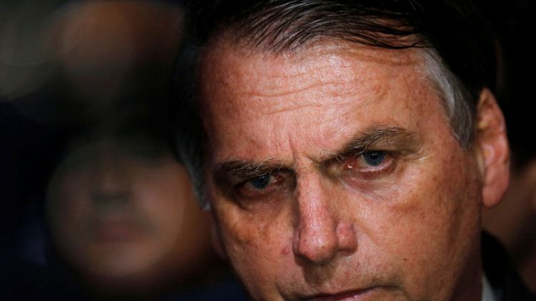 Brazil's Bolsonaro signs decree easing gun import, ammo limits