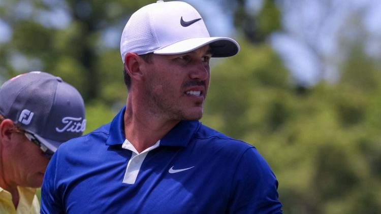 Golf - Koepka uses visit to the Big D to prepare for Big Apple