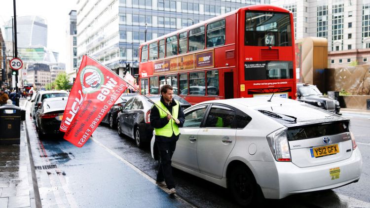 Eyeing IPO riches, Uber drivers go on strike in U.K. and U.S.