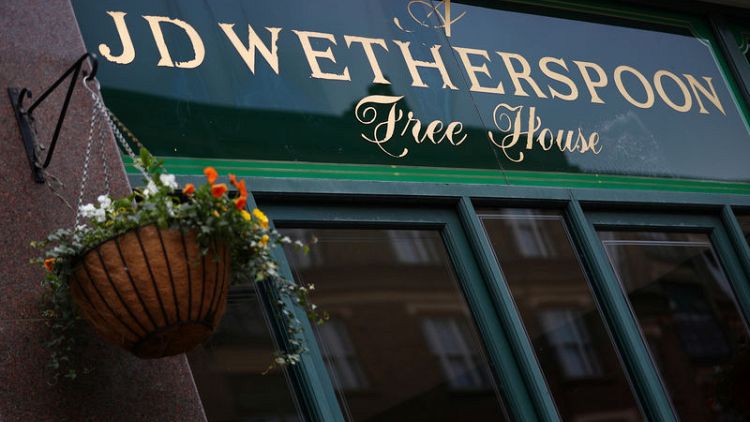 Higher costs for bar staff take shine off J D Wetherspoon's sales rise