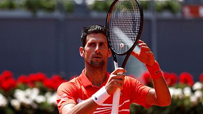 Djokovic in Madrid Open semis after Cilic food poisoning withdrawal Djokovic in Madrid Open semis after Cilic food poisoning withdrawal