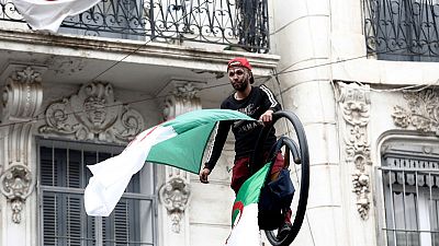 Tens of thousands march to demand change in Algeria Tens of thousands march to demand change in Algeria
