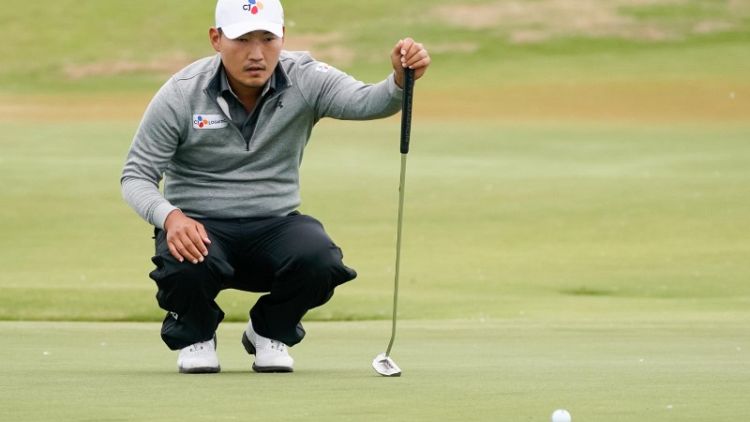 South Korea's Kang bolts clear in Dallas with sparkling 61