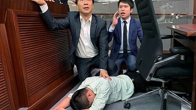 Hong Kong legislators brawl over contentious extradition law Hong Kong legislators brawl over contentious extradition law