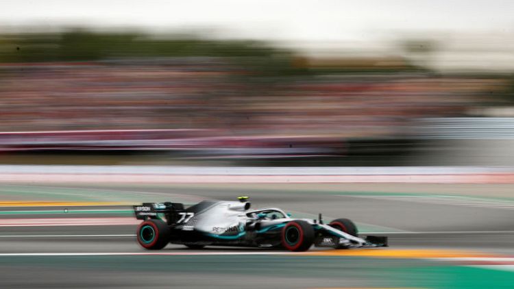 Motor racing - Bottas on pole in Spain for third race in a row