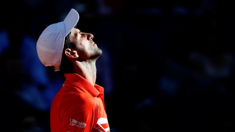 Djokovic back to best against Thiem to reach Madrid final