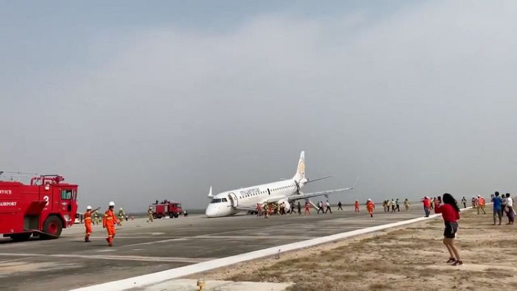 Myanmar pilot safely lands plane on its nose after landing gear failure