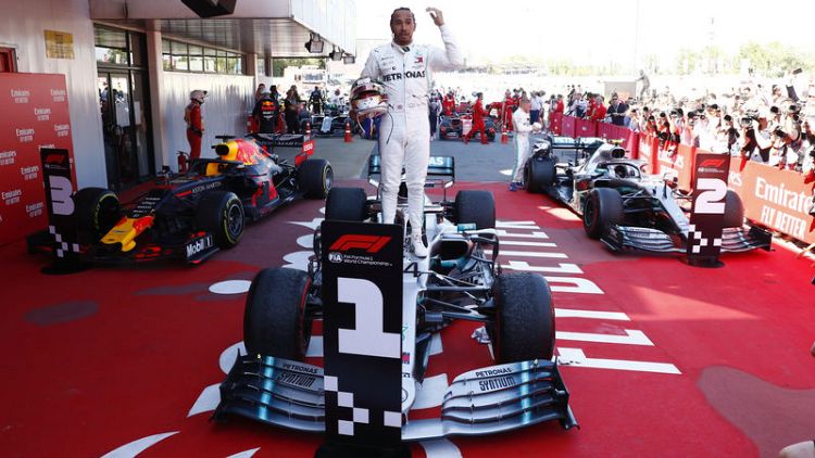 Hamilton back on top with victory in Spain