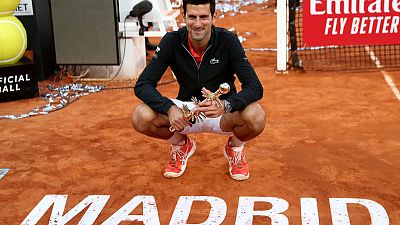 Djokovic claims third Madrid Open title after seeing off Tsitsipas Djokovic claims third Madrid Open title after seeing off Tsitsipas