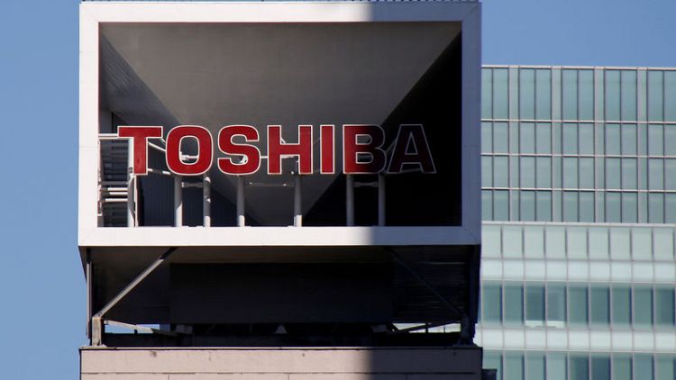 Toshiba reiterates annual profit outlook; LNG risk remains