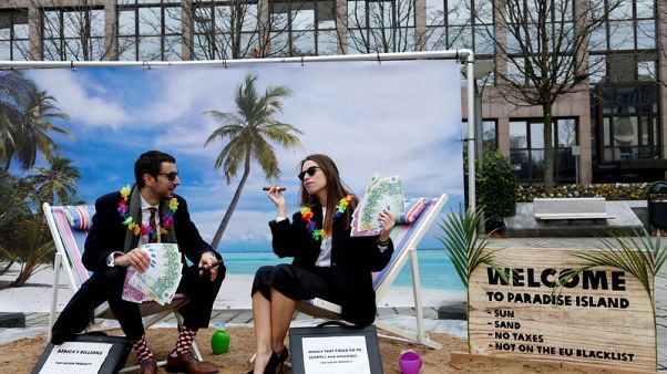 EU to remove UK, Dutch overseas territories from tax haven blacklist EU to remove UK, Dutch overseas territories from tax haven blacklist