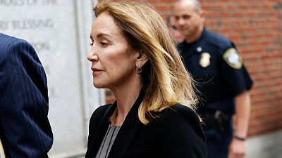 Tearful Felicity Huffman admits role in U.S. college admissions scandal Tearful Felicity Huffman admits role in U.S. college admissions scandal