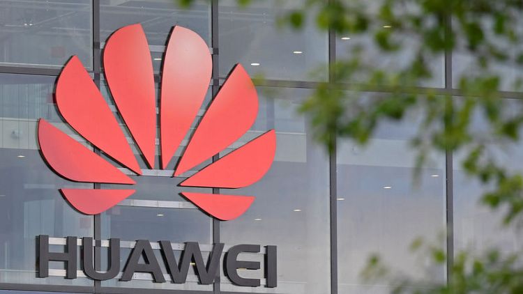 Exclusive: Trump expected to sign order paving way for U.S. telecoms ban on Huawei