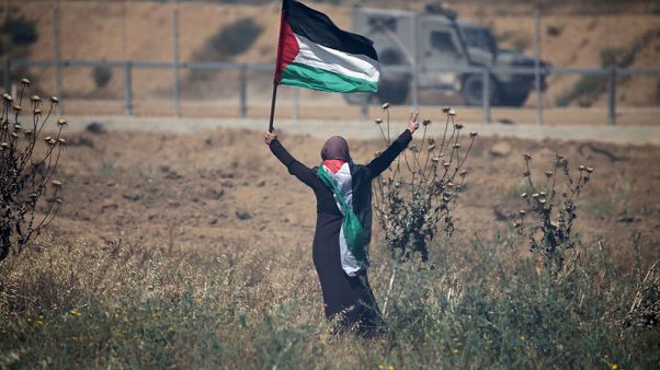 إصابة نحو 50 فلسطينيا في احتجاجات عند حدود غزة في ذكرى النكبة إصابة نحو 50 فلسطينيا في احتجاجات عند حدود غزة في ذكرى النكبة