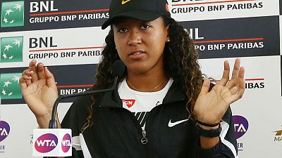 Osaka pulls out of Rome quarters with hand injury Osaka pulls out of Rome quarters with hand injury