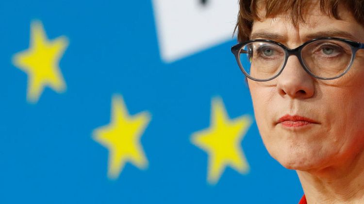 Merkel's heir apparent denies pressuring German chancellor to resign