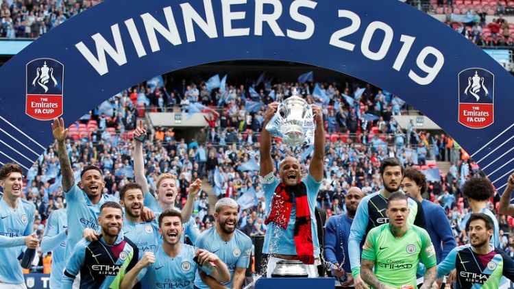 Manchester City crush Watford 6-0 to complete treble in style