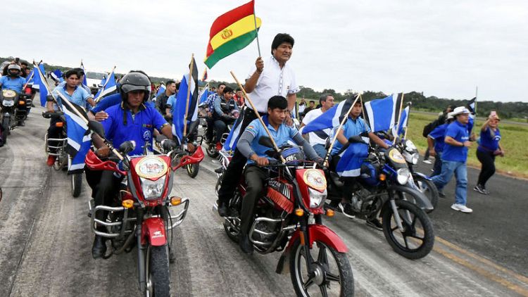 Bolivia's Morales defies term limits, launches bid for fourth term