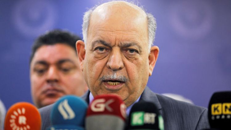 Iraq oil minister says deal with Exxon close, slowed by evacuation