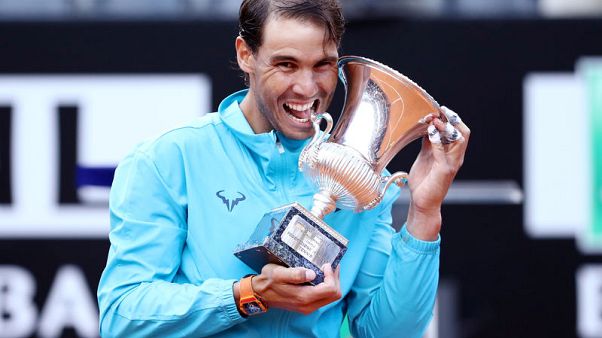 Imperious Nadal fends off Djokovic to land ninth Rome title Imperious Nadal fends off Djokovic to land ninth Rome title