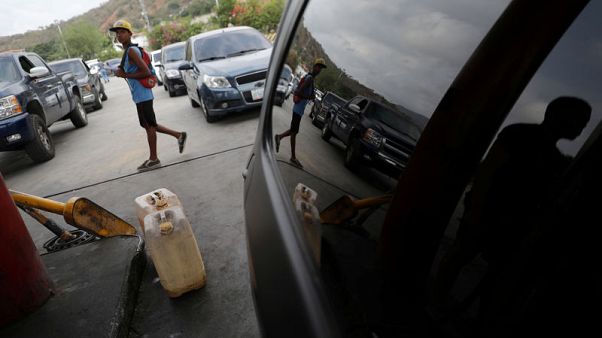 Soldiers oversee fuel rationing in some Venezuelan towns amid shortages Soldiers oversee fuel rationing in some Venezuelan towns amid shortages
