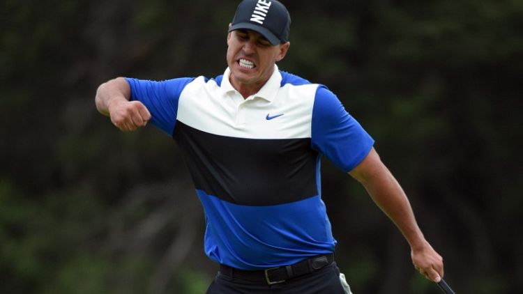 Koepka survives to win PGA Championship and fourth major