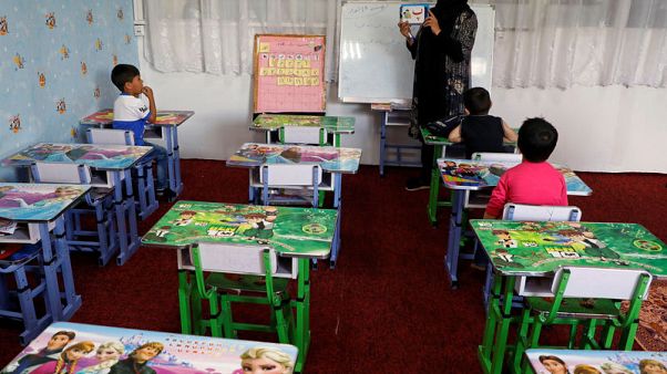 Afghan working women still face perils at home and office Afghan working women still face perils at home and office