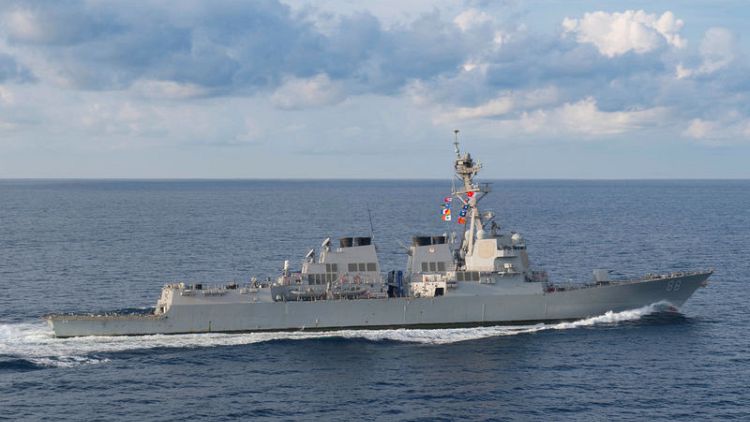U.S. warship sails in disputed South China Sea amid trade tensions