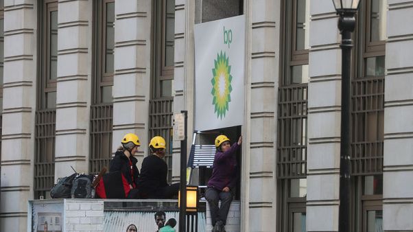 Greenpeace activists block BP London HQ demanding end to oil exploration Greenpeace activists block BP London HQ demanding end to oil exploration