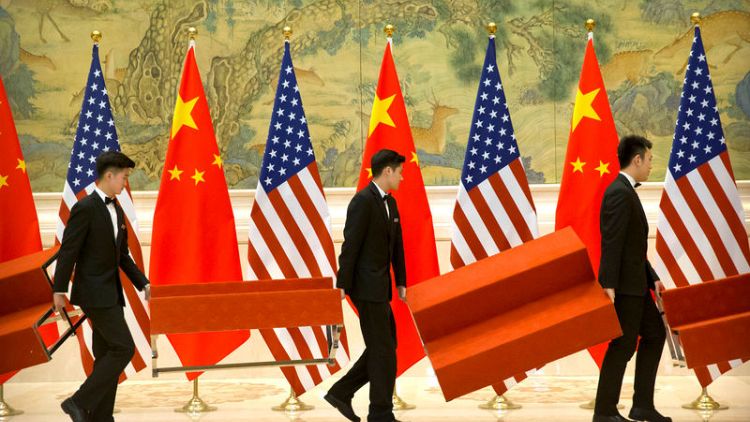 U.S., China bicker over 'extravagant expectations' on trade deal